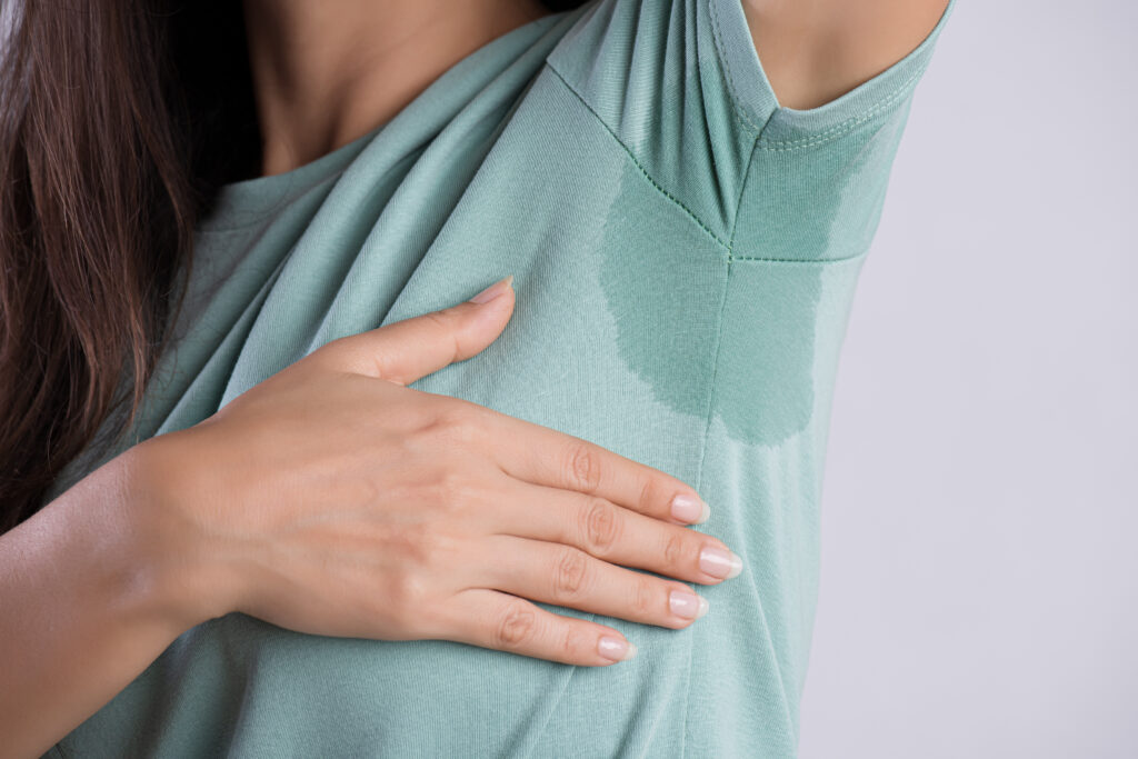 Close up,Woman,With,Hyperhidrosis,Sweating.,Young, Woman,With